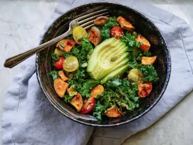 Kale, roasted yams and avocado salad
