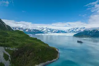 Cruise ship floats just offshore of the Hubbard Glacier