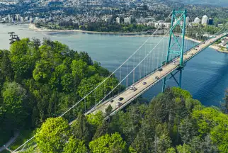 cars drive over a bridge in Thousand Islands National Park, Canada